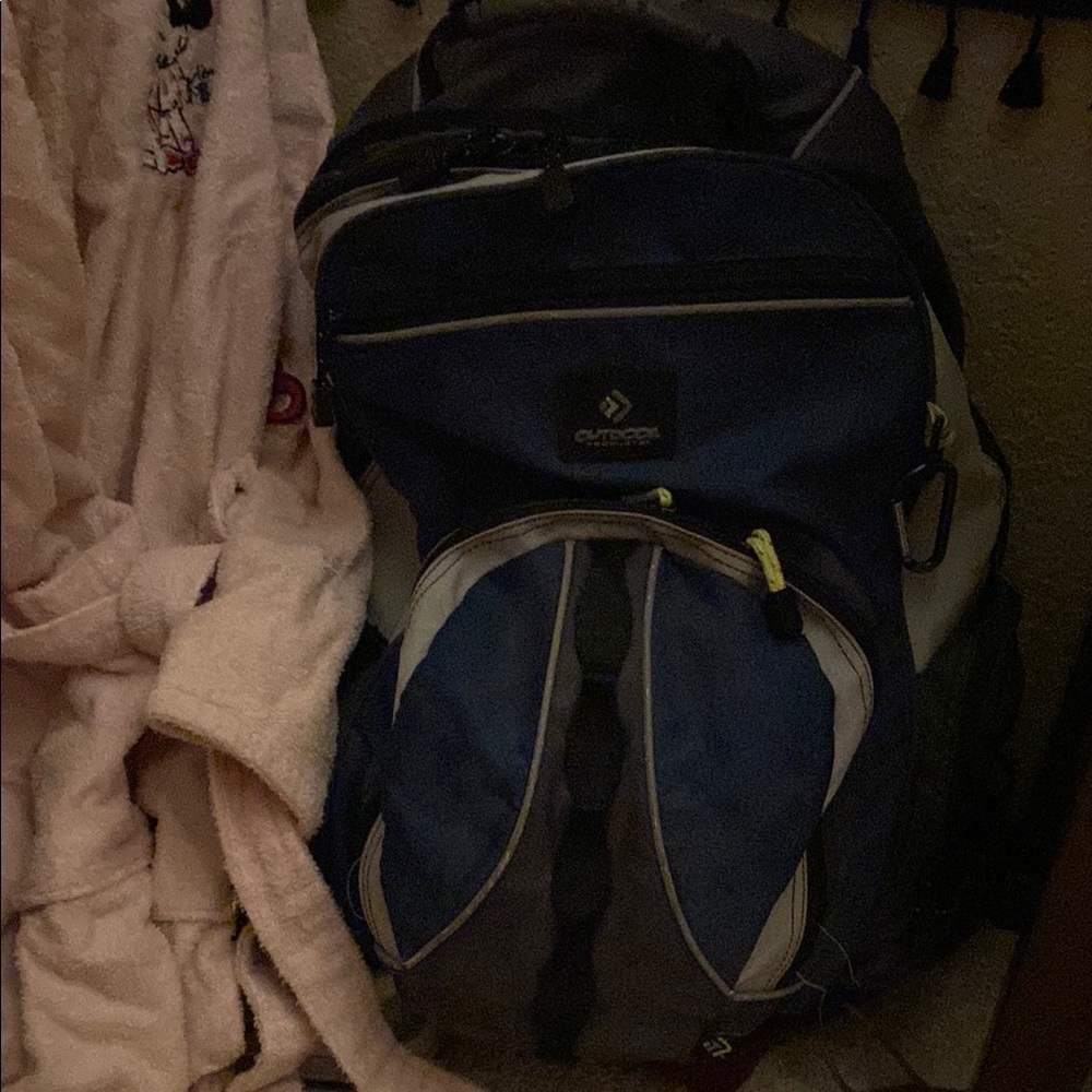 Blue and Black Backpack with Padded Straps and Durable Fabric